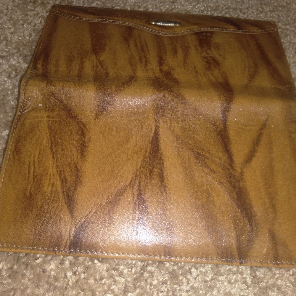 Coni Cocci wallet Brown in color